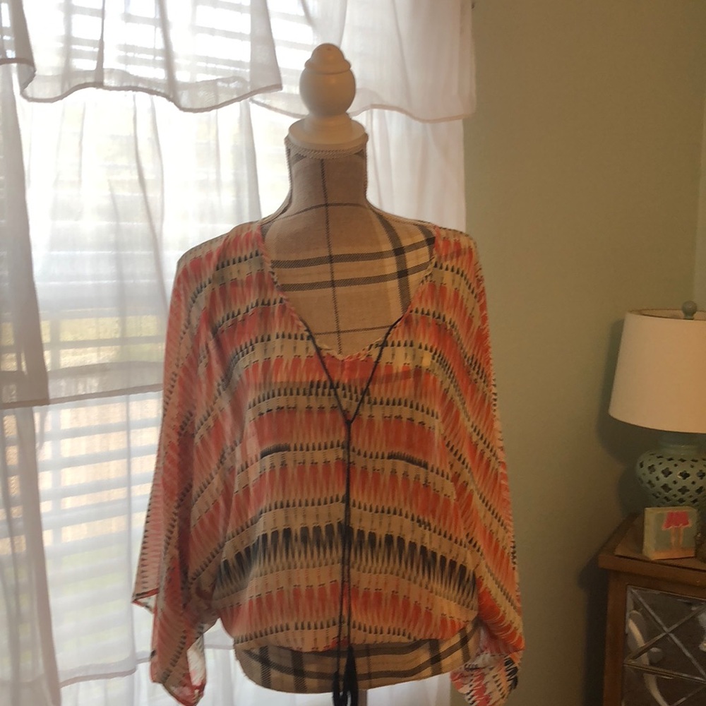 Orange and navy top